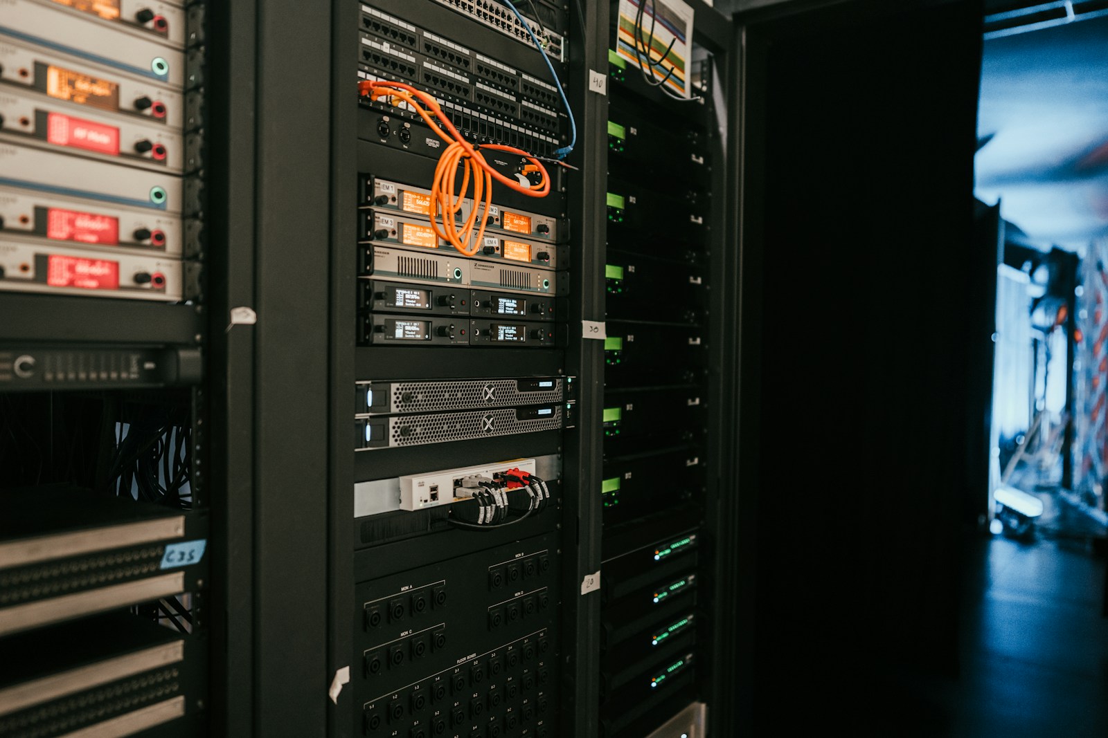 Server rack in a dark datacenter — VPS security for WordPress agencies